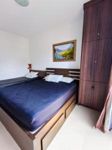 Katil atau katil-katil dalam bilik di APARTAMENTO PÉ NA AREIA, PRAI DO FORTE, CABO FRIo