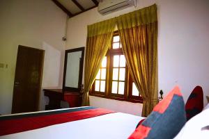 Letto o letti in una camera di The European Gate - Anuradhapura