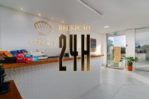 a restaurant with a sign that reads recrecaza at Hotel Conchas in Penha