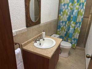 Koupelna v ubytování Deluxe Cumbaya Suite