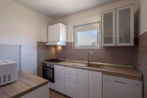 Kuchyň nebo kuchyňský kout v ubytování Apartment in Stari Grad - Insel Hvar 6321