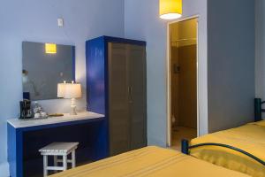 Postel nebo postele na pokoji v ubytování Casa de Don Pablo Hostel