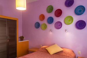 Postel nebo postele na pokoji v ubytování Casa de Don Pablo Hostel