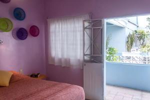 Postel nebo postele na pokoji v ubytování Casa de Don Pablo Hostel