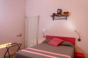Postel nebo postele na pokoji v ubytování Casa de Don Pablo Hostel