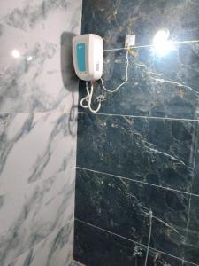 Ένα μπάνιο στο Hotel DIVYA DARSHAN