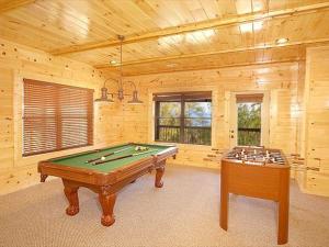 a billiard room with a pool table and sidx sidx sidx at Sweet Dreams Holiday home in Gatlinburg
