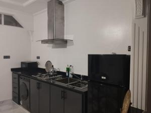 Nhà bếp/bếp nhỏ tại Super appartement quartier paisible proches toutes commodités +16 ảnh