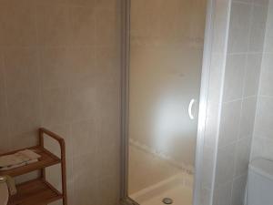 a shower with a glass door in a bathroom at Maison spacieuse avec jardin à Jayac, 3 chambres - FR-1-616-465 in Jayac