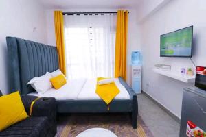 TV a/nebo společenská místnost v ubytování TrueComfort