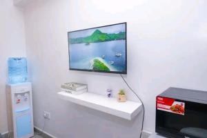 TV a/nebo společenská místnost v ubytování TrueComfort