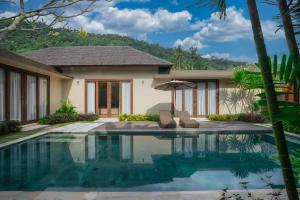Πισίνα στο ή κοντά στο Bale Mandala Villas