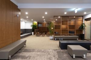 TV a/nebo společenská místnost v ubytování Shilla Legacy Hotel