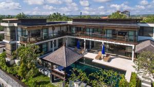 an aerial view of a house with a swimming pool at Villa Adenium by Elite Havens in Jimbaran