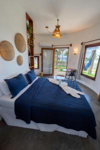 Cama ou camas em um quarto em VentoVinte Beach Club