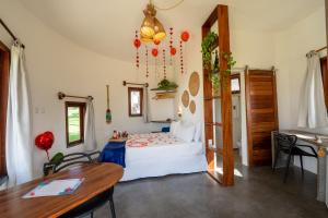 Cama ou camas em um quarto em VentoVinte Beach Club