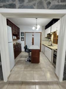 Kuchyň nebo kuchyňský kout v ubytování Bendita casa 2