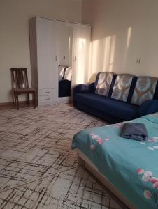 Postel nebo postele na pokoji v ubytování Apartment Yug-2 + 5 fotografií