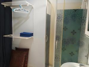a shower with a glass door next to a sink at Daddy's home Huahin in Hua Hin +73 photos