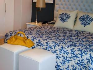 Postel nebo postele na pokoji v ubytování Island Hotel Durban