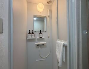 حمام في Neighbor's Hotel 西広島駅前