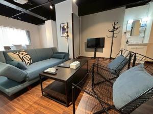 تلفاز و/أو أجهزة ترفيهية في Neighbor's Hotel 西広島駅前