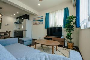 Η κουζίνα ή μικρή κουζίνα στο Value Residence 与那覇 プール 無料レンタカー付
