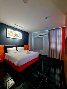 Ένα ή περισσότερα κρεβάτια σε δωμάτιο στο Eng Wan Hotel +12 φωτογραφίες