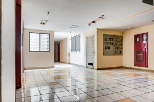 Φωτογραφία από το άλμπουμ του Hotel O Apartement Cibubur Village kaisar property Lobby B σε Pedurenan Dua +19 φωτογραφίες