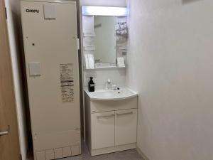 حمام في Neighbor's Hotel 西広島駅前