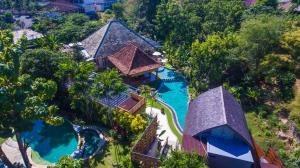 an aerial view of a resort with a swimming pool at Sunset Paradise Villa Nusa Dua in Nusa Dua