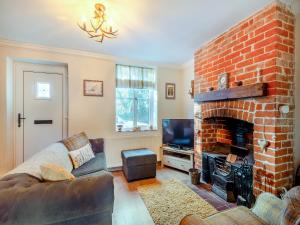 TV a/nebo společenská místnost v ubytování Rose Cottage