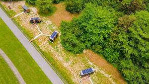 an overhead view of a park with solar panels and trees at Tiny Away Escape at Lazarus - 2017 in Singapore