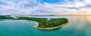 an island in the middle of a large body of water at Tiny Away Escape at Lazarus - 2017 in Singapore
