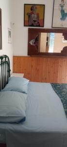 Postel nebo postele na pokoji v ubytování natura e relax sul mare
