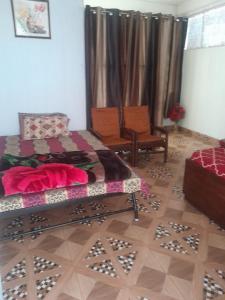Postel nebo postele na pokoji v ubytování Jungle Zostel Homestay