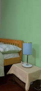 Postel nebo postele na pokoji v ubytování Greenfield Homestay -Full board