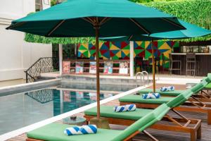 Bazén v ubytování Swiss-Belhotel Rainforest nebo v jeho okolí