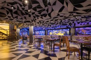 Restoran või mõni muu söögikoht majutusasutuses Hilton Garden Inn Asuncion Aviadores Del Chaco