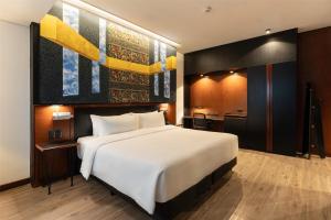 Voodi või voodid majutusasutuse Hilton Garden Inn Asuncion Aviadores Del Chaco toas
