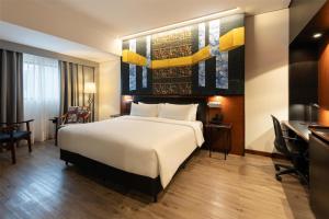 Voodi või voodid majutusasutuse Hilton Garden Inn Asuncion Aviadores Del Chaco toas