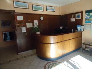 a lobby with a reception desk in a hotel at Albergo La Mimosa in Lerici