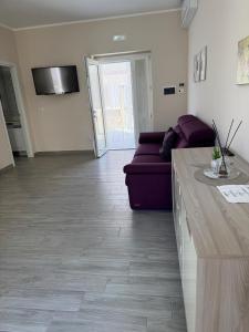 A television and/or entertainment centre at Casa vacanze La Fenice