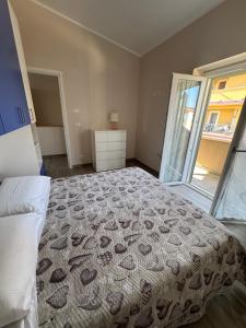 A bed or beds in a room at Casa vacanze La Fenice