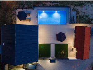 an overhead view of a room with umbrellas at Luxury Grey house in Stolac