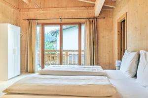 Posteľ alebo postele v izbe v ubytovaní Chalet - Apartments Joel