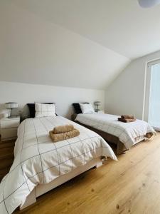 Postel nebo postele na pokoji v ubytování Apartma DUDI