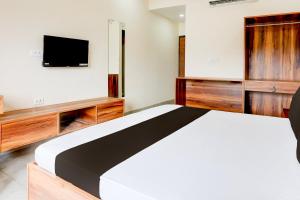 Μια τηλεόραση ή/και κέντρο ψυχαγωγίας στο Hotel O Nandi