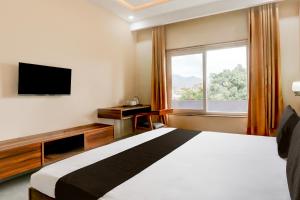 Μια τηλεόραση ή/και κέντρο ψυχαγωγίας στο Hotel O Nandi