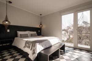 Postel nebo postele na pokoji v ubytování Apart Hotel B